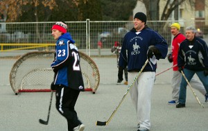 Sam Reinhart, left, cuts toward the net - tipped over and backwards to make scoring harder in the goalie-less tilt.