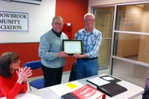 Bob presented John with a Certificate of Appreciation for his service.