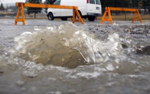 Water gushes out of a small hole in 3rd Street South. Ian Cobb/e-KNOW photos