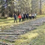 Volunteers help ERA collect trees for restoration work